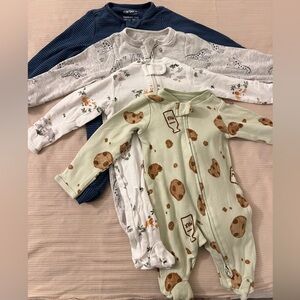 Lot of 4 Newborn Footie Pajamas - Carter’s